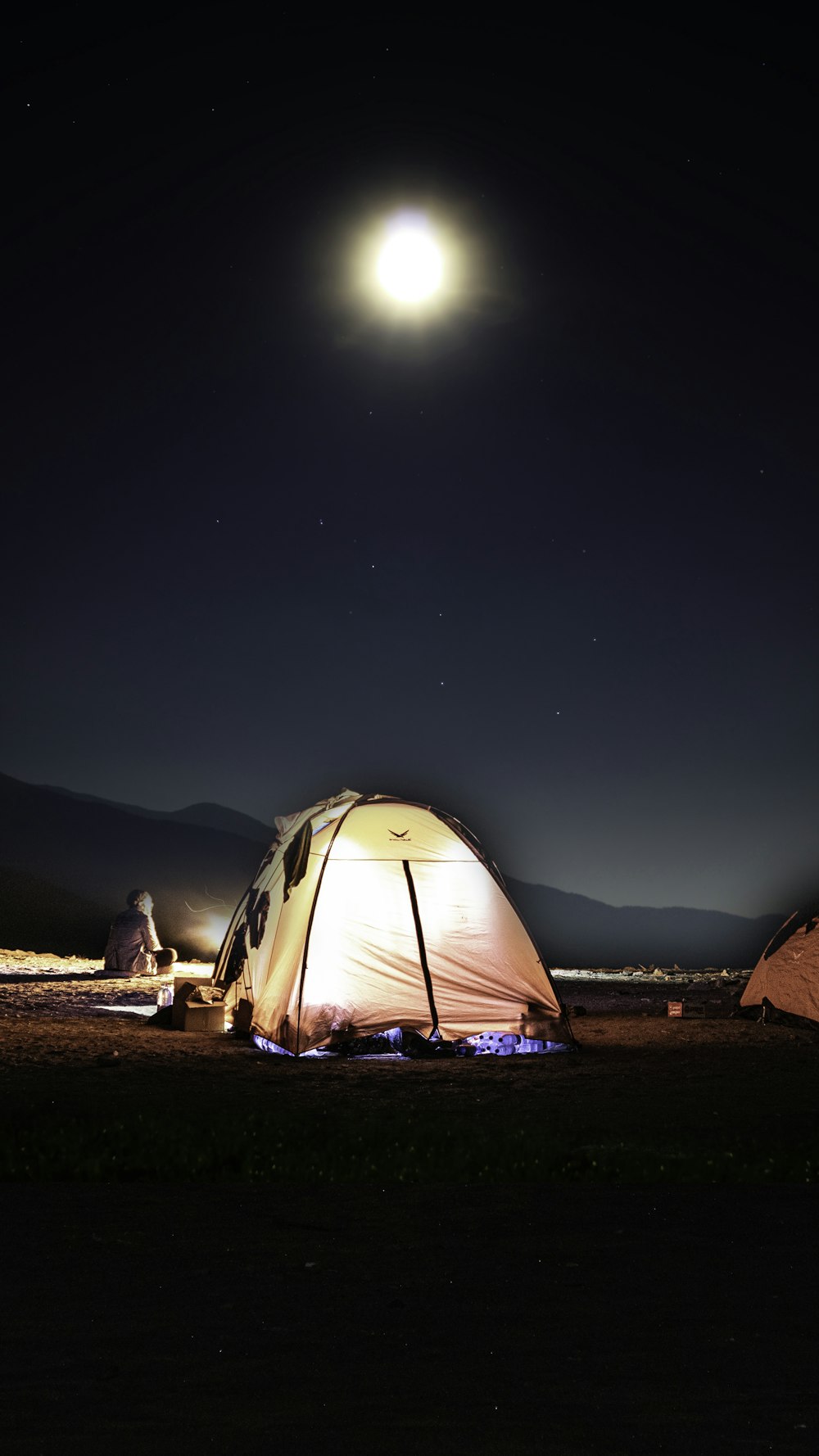 white tent under blue sky during night time