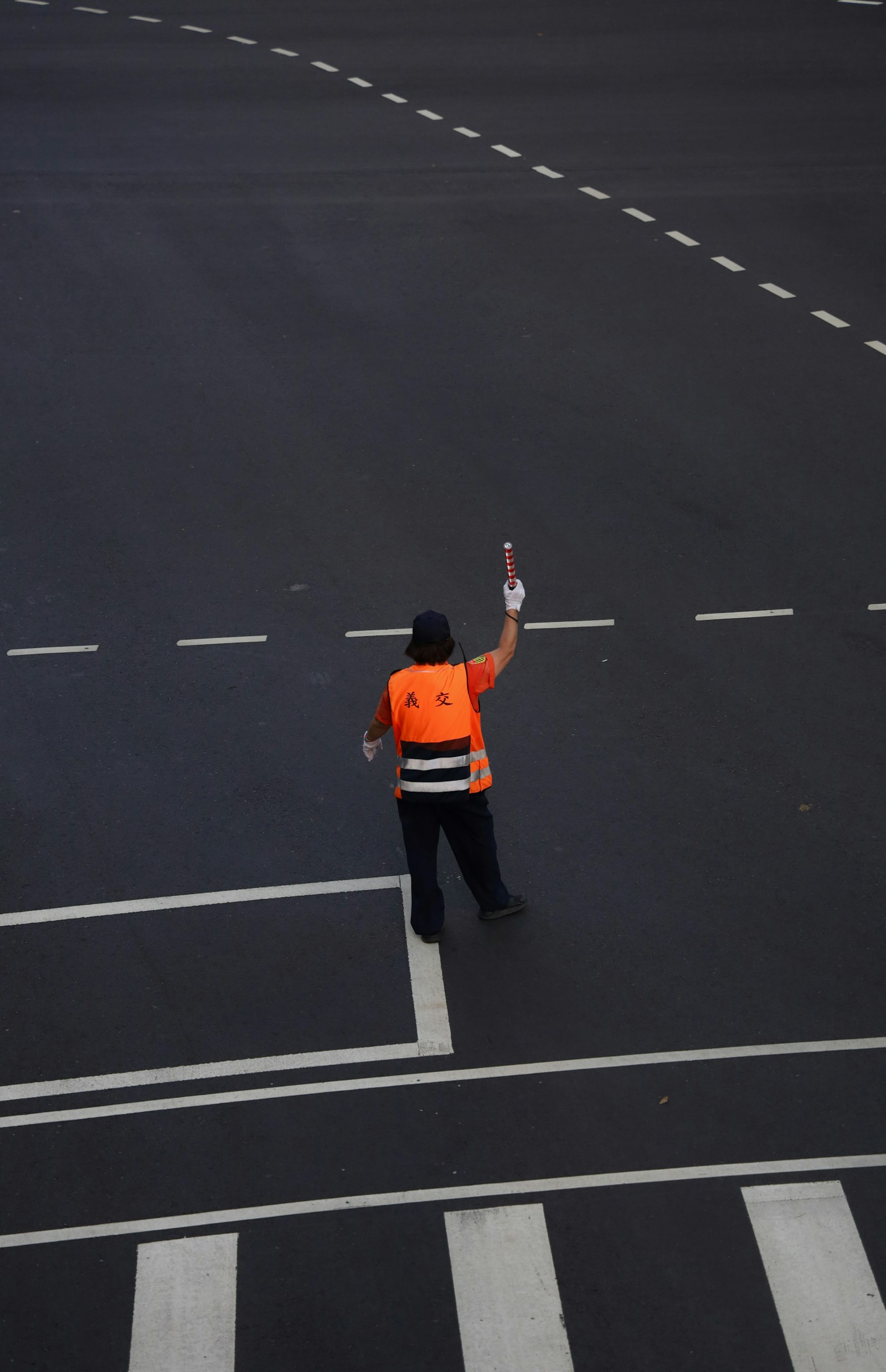 Canon EOS RP + Canon RF 24-105mm F4L IS USM sample photo. Man in orange jacket photography