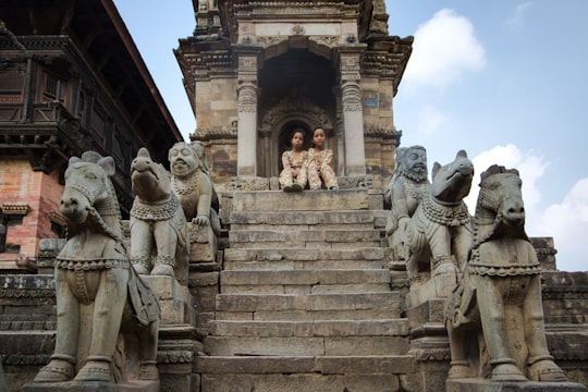 people in white robe statues in Bhaktapur Nepal