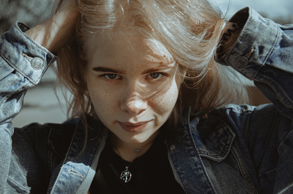 woman in blue denim jacket