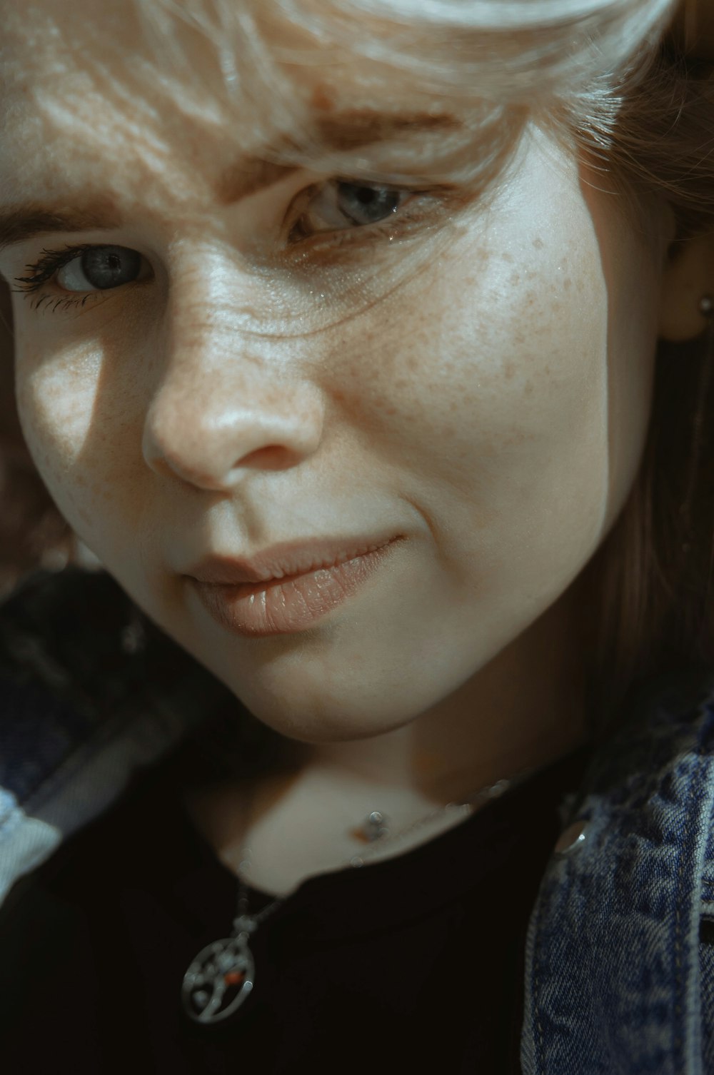 woman in blue denim jacket