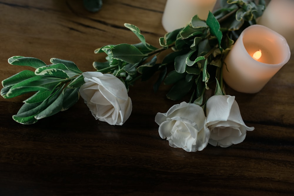 white flowers on brown wooden table