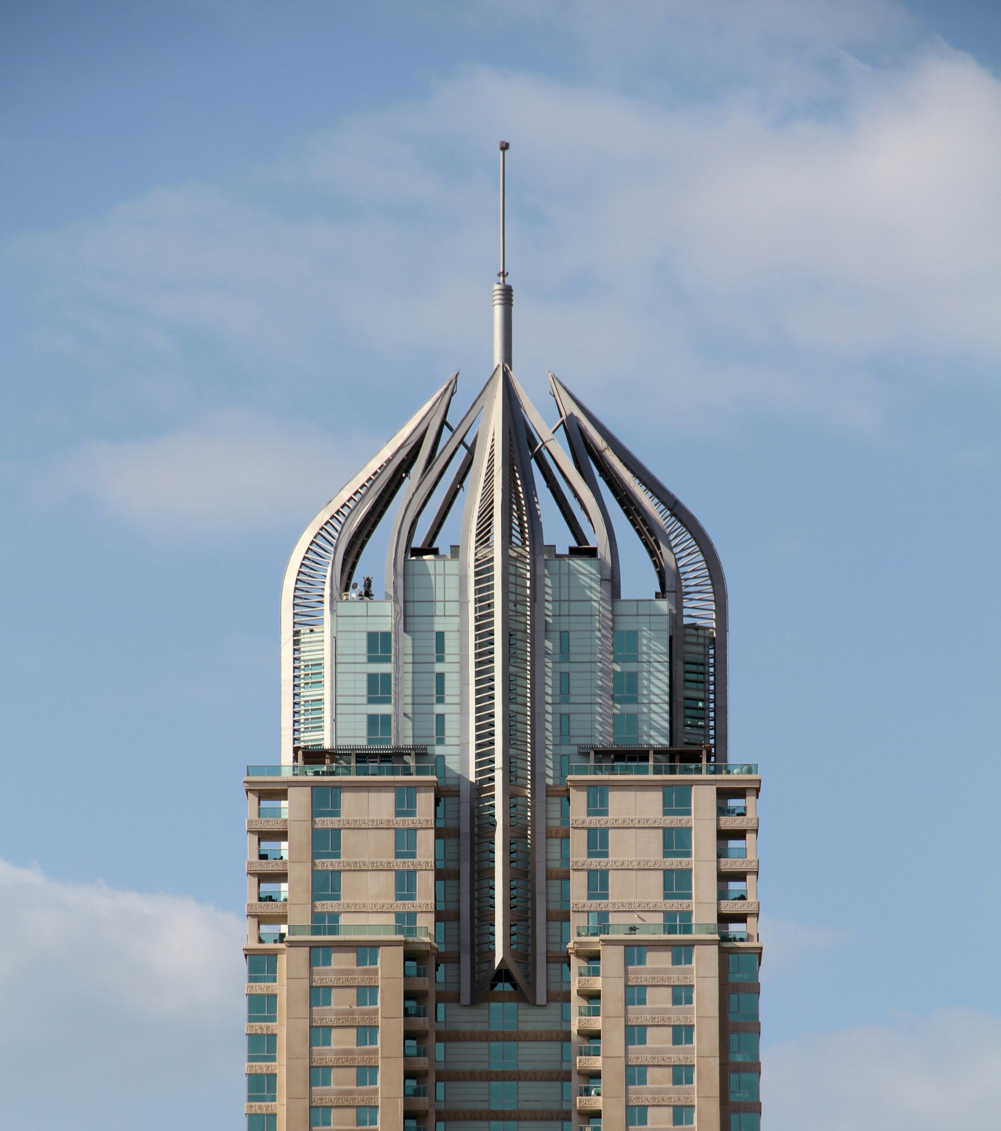brown and gray concrete building under blue sky during daytime