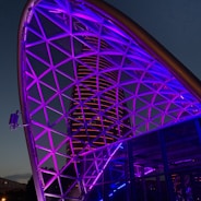 A futuristic cityscape illustrating IoT connectivity with glowing network lines