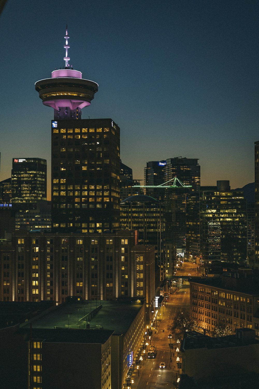 city skyline during night time