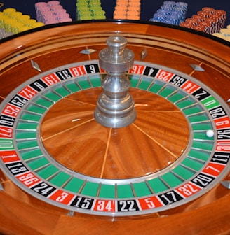 brown and silver round analog clock