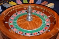 brown and silver round analog clock