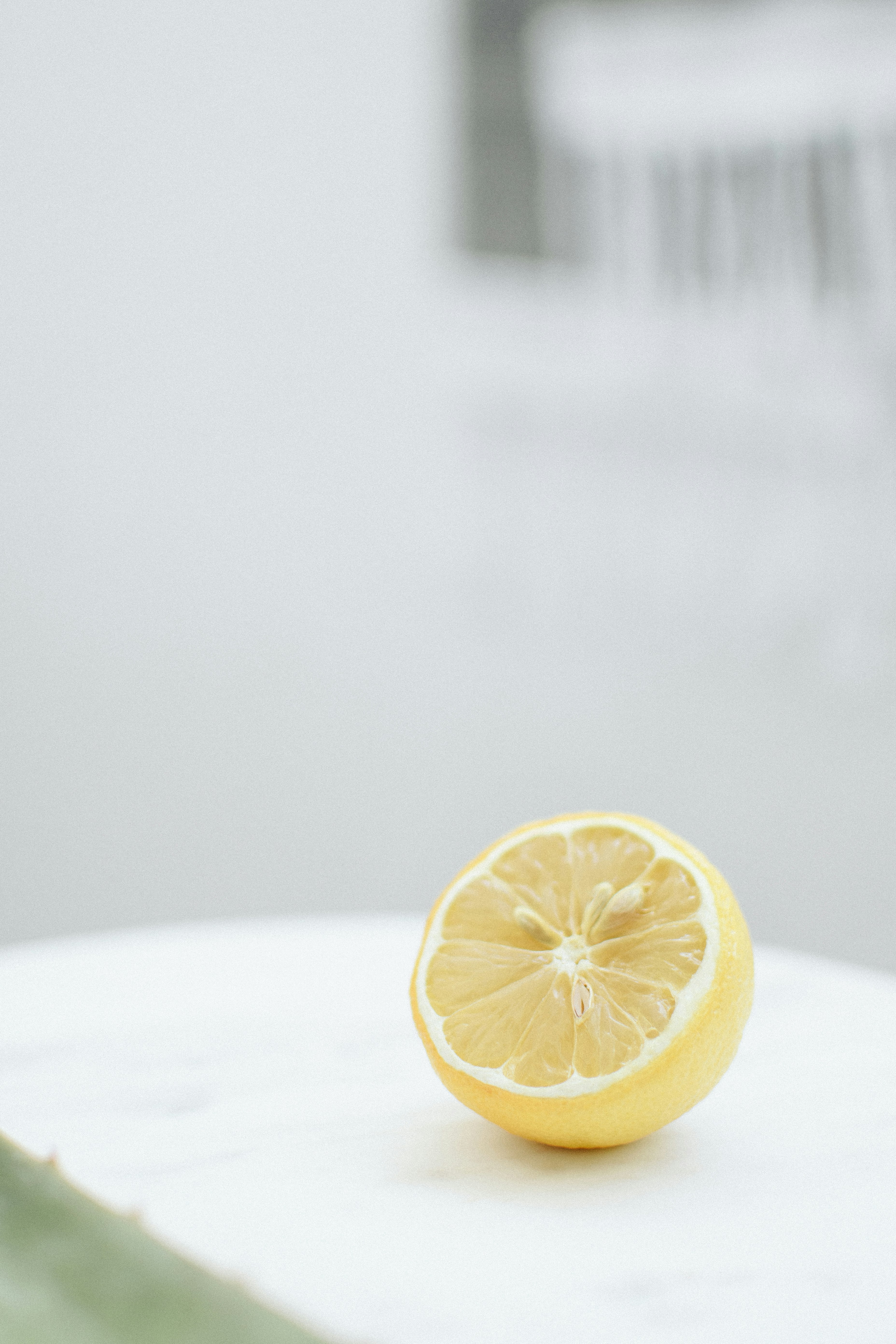 yellow lemon on white table