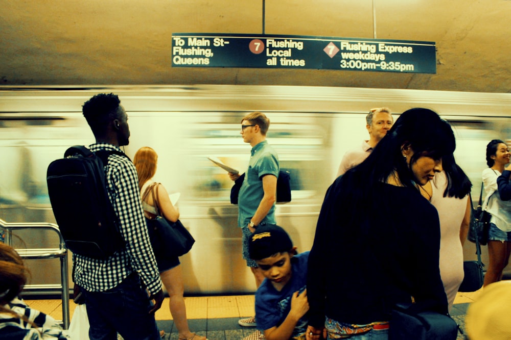 people in a train station