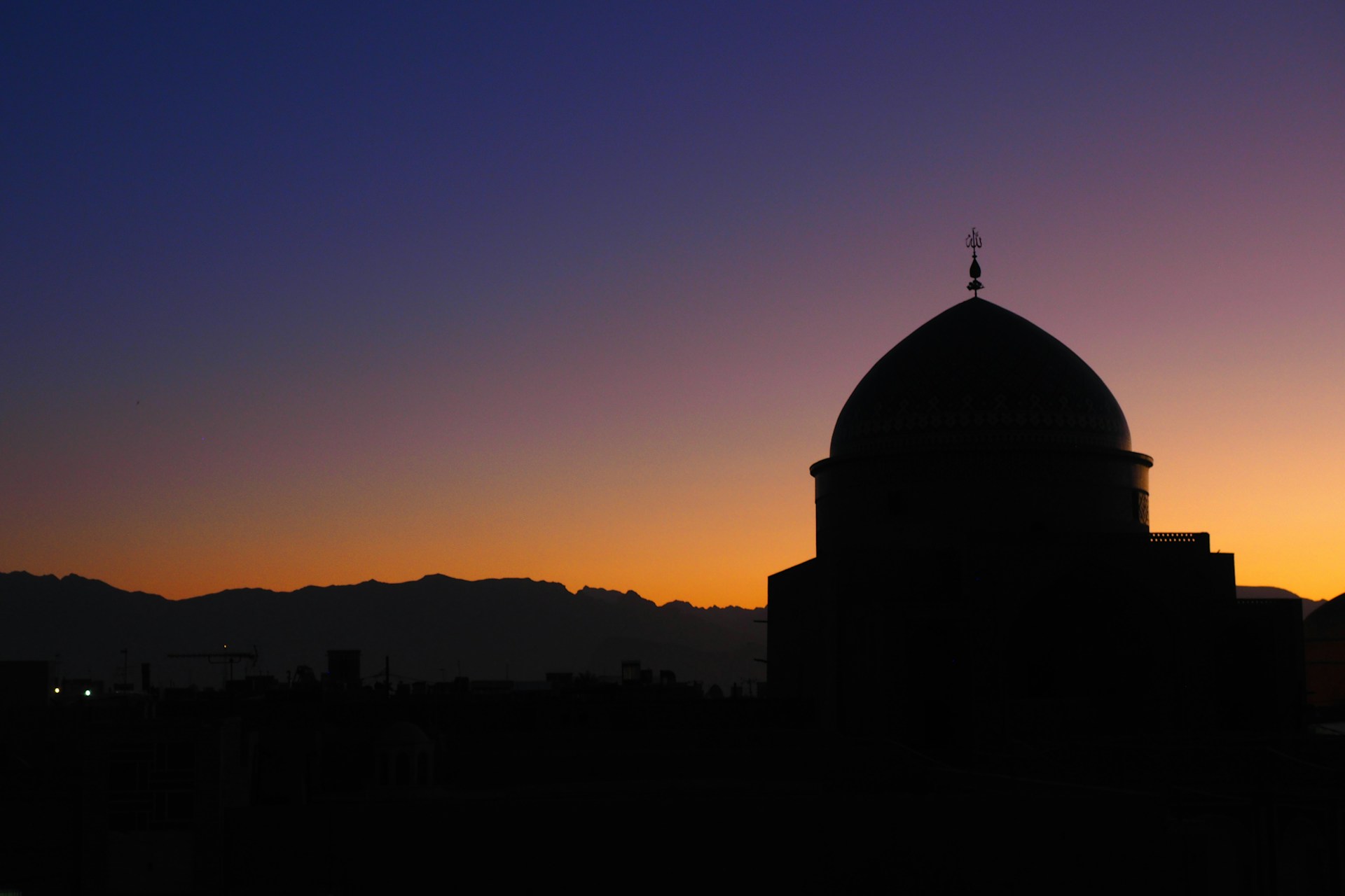 silhouette of building during sunset
