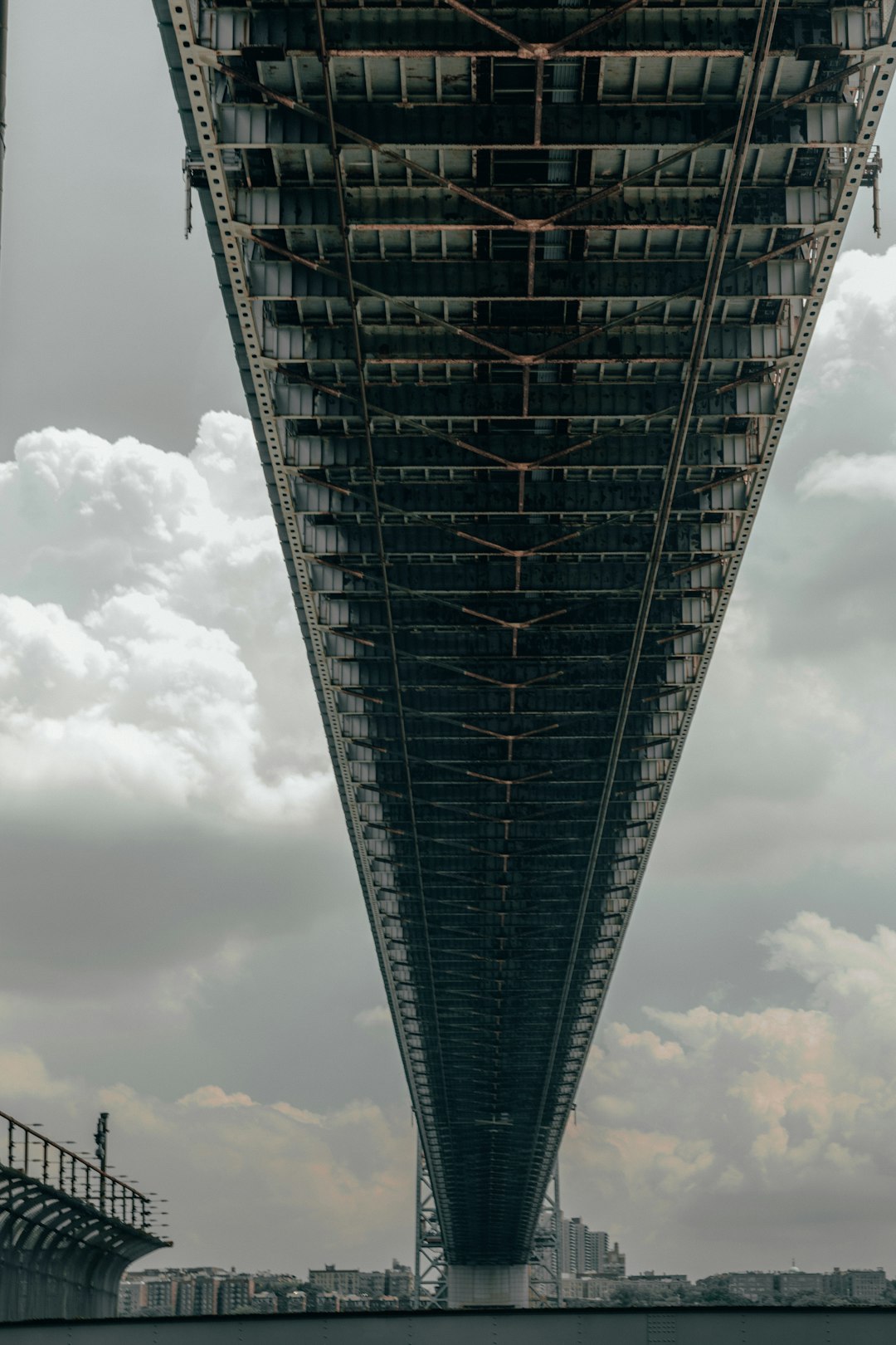 black metal tower under white clouds