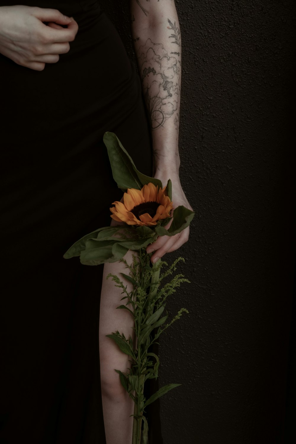 yellow flower in white ceramic vase