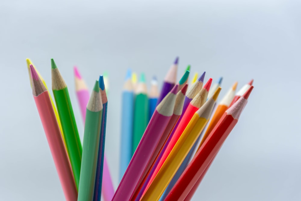 multi color coloring pencils in close up photography