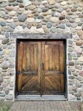 Rustic wooden door installed in a home setting.