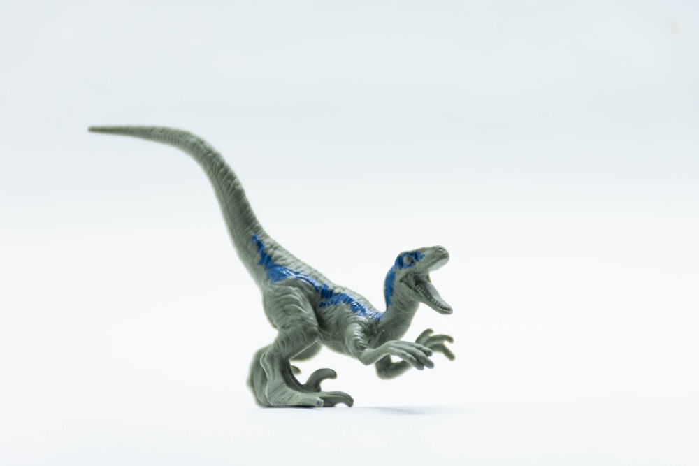 gray and blue dragon figurine