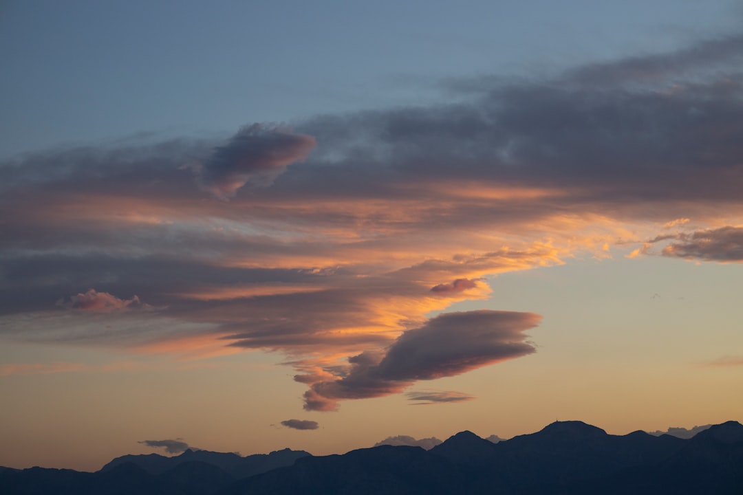 silhouette of mountains during sunset