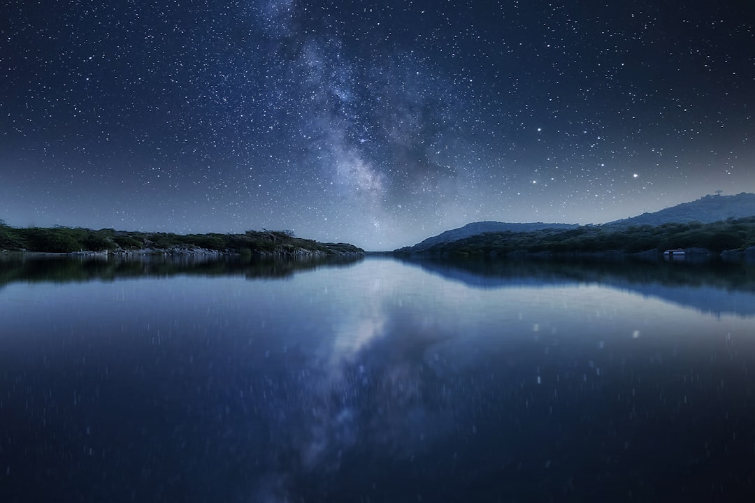body of water under starry night, A night to remember under million stars.🌌