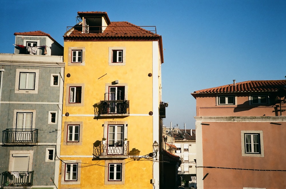 beige concrete building under blue sky during daytime