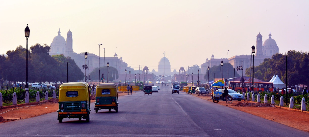 yellow bus on road during daytime