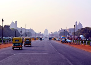 yellow bus on road during daytime