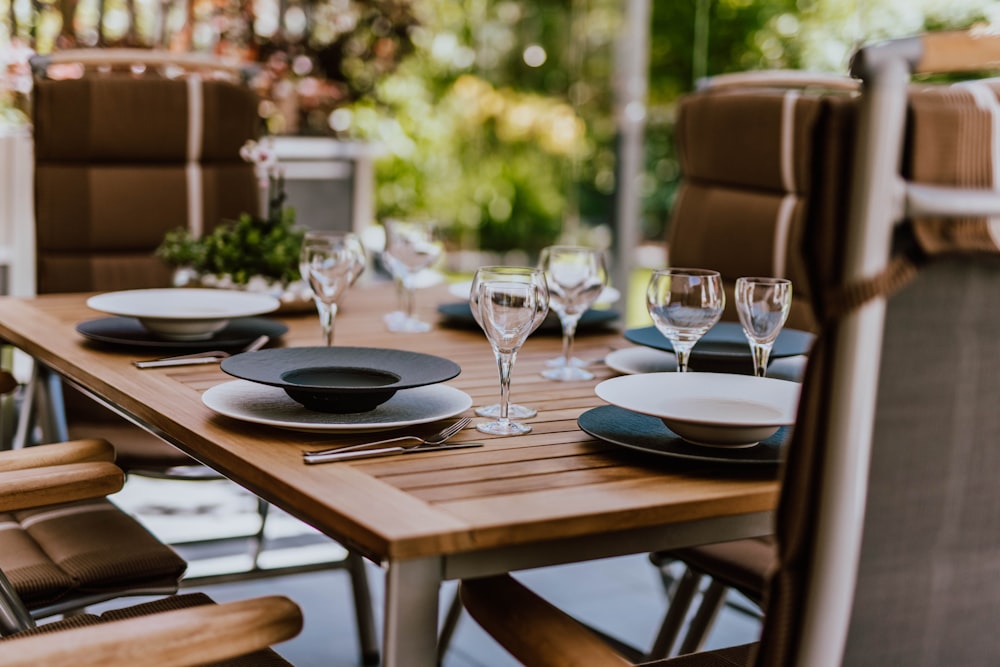 clear wine glass on brown wooden table