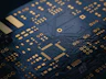 close up of dark blue circuit board