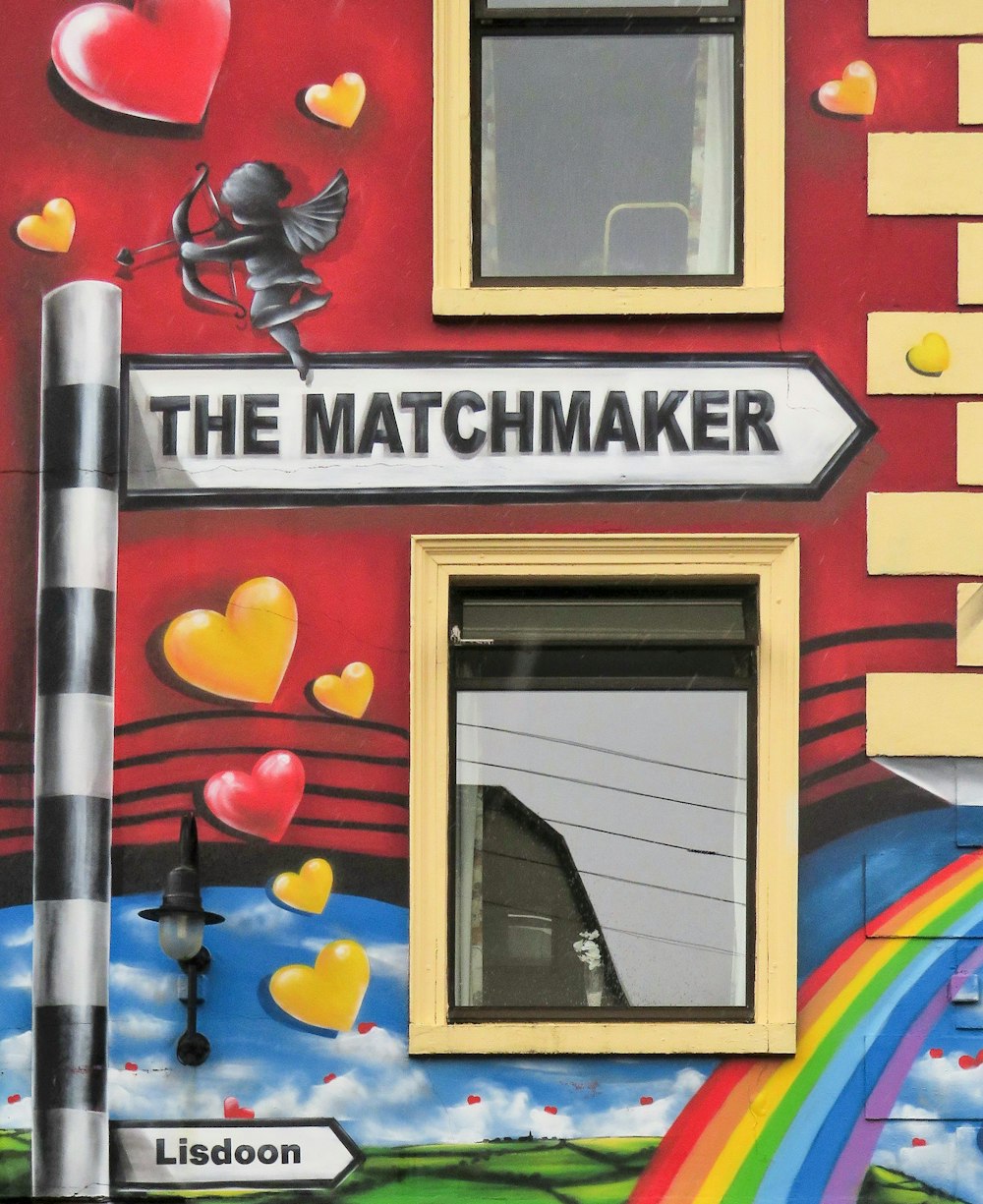 a colorful building with a sign that says the matchmaker