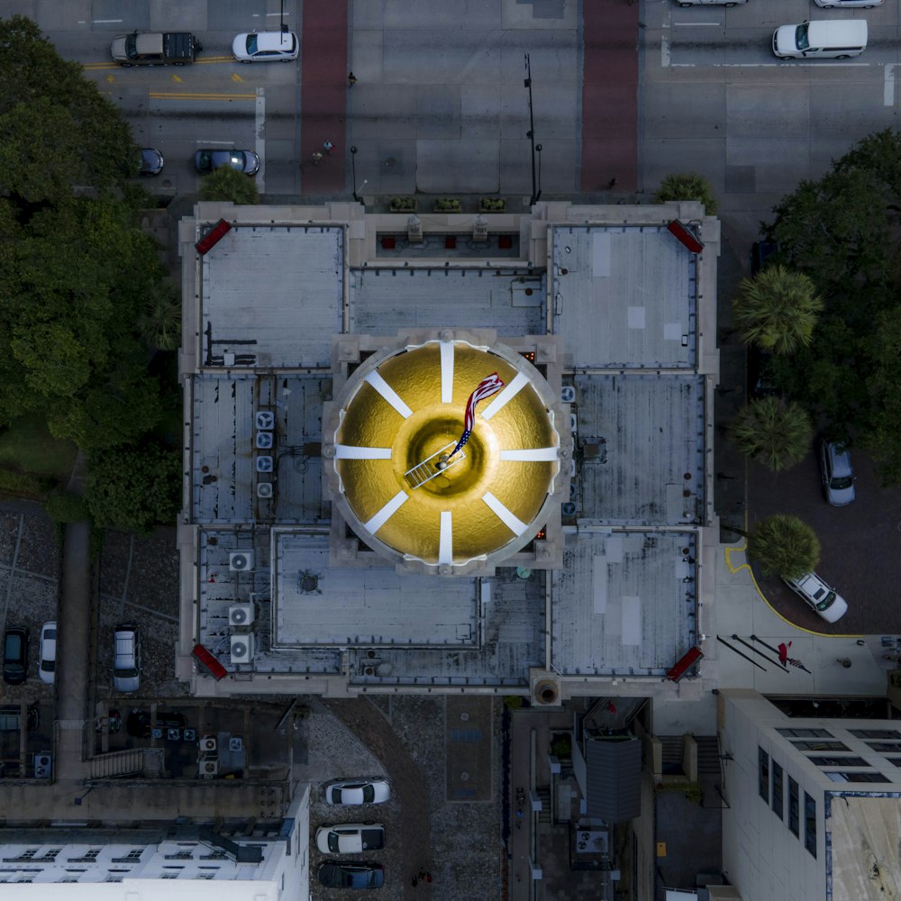 white and yellow round building