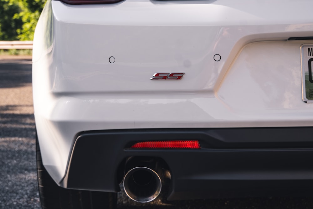 white car with red and black license plate