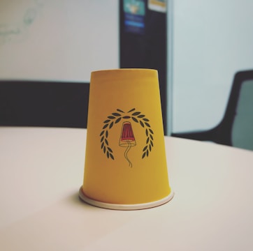 Trademark registration certificate on a desk.