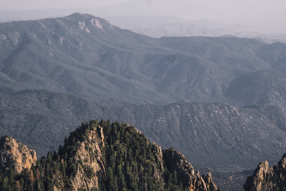 green and brown mountain under white sky during daytime