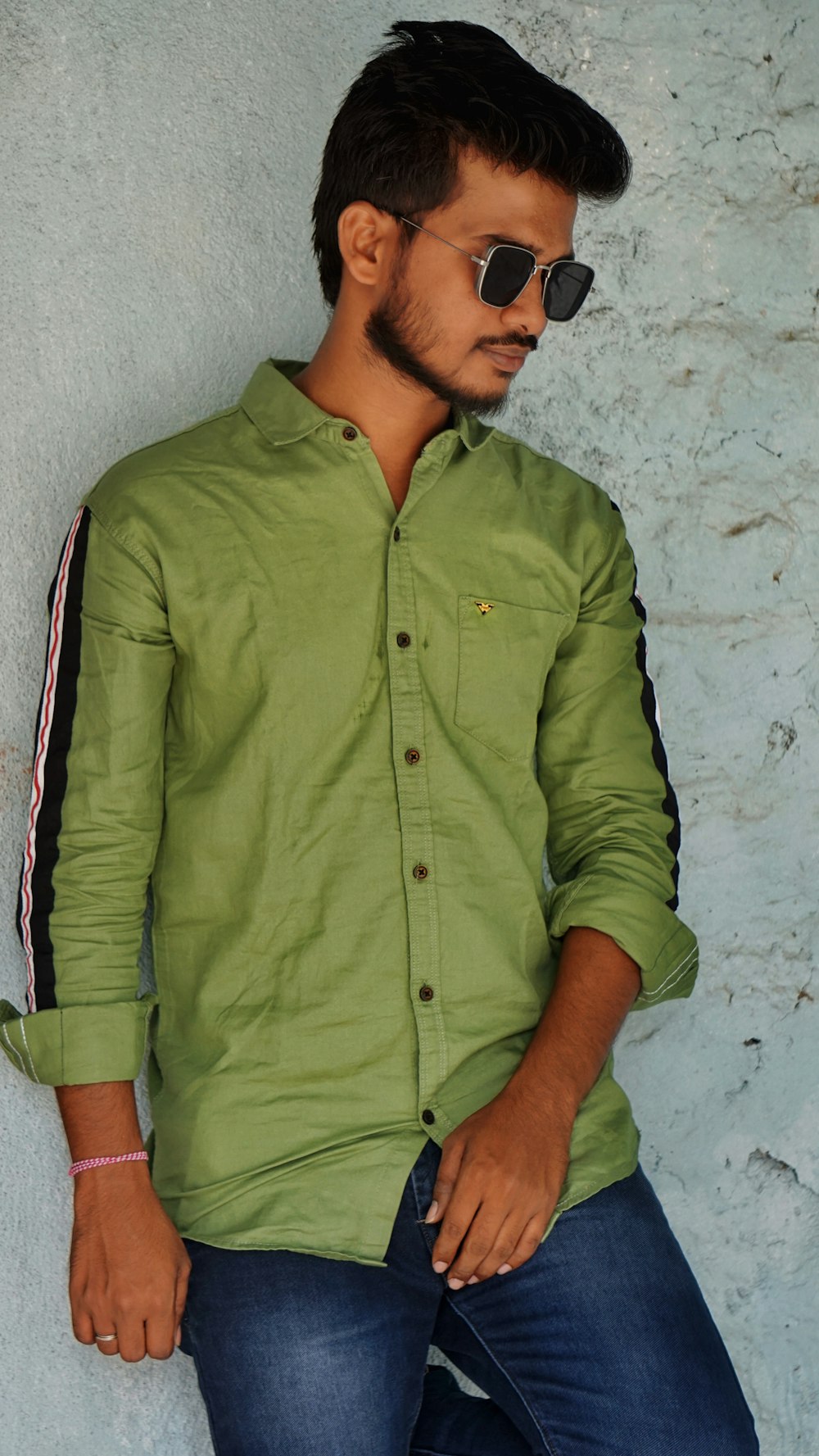 man in green button up shirt