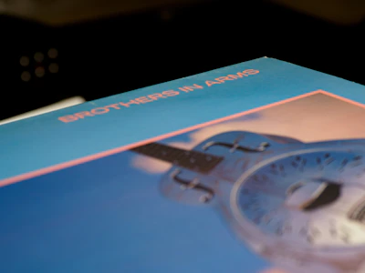 Album cover art for 'Box of Blues' featuring a moody, deep blue abstract design with subtle musical notes.