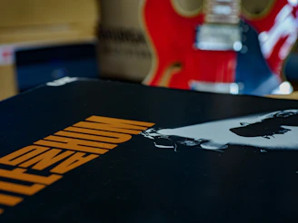 Close-up of a Lightlines band t-shirt with vibrant alt pop/rock artwork.