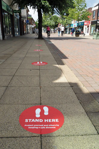 red stop sign on gray brick floor