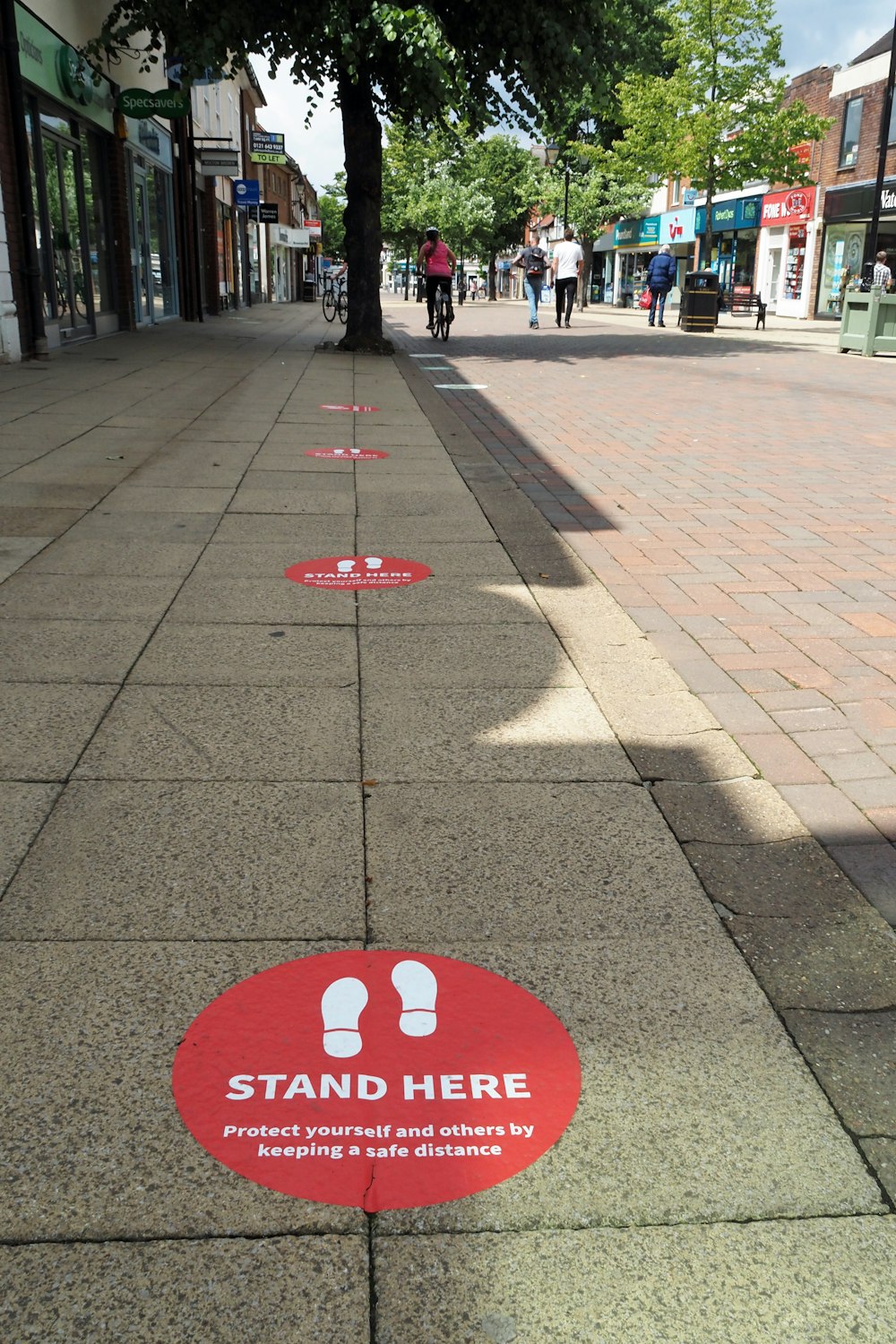 red stop sign on gray brick floor