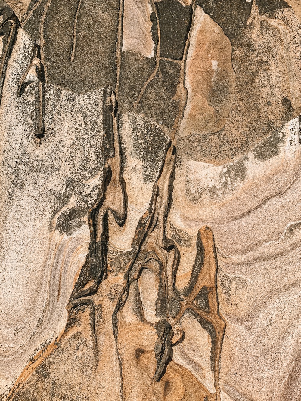 brown sand with shadow of person