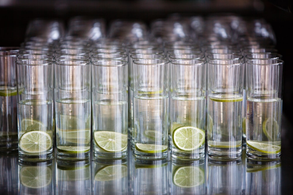 clear drinking glasses with water