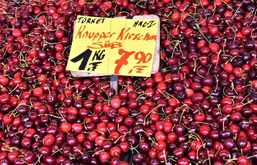 red round fruits on display