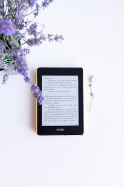 black e book reader on white surface