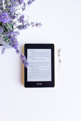 black e book reader on white surface
