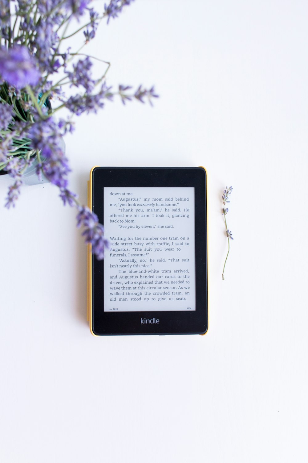 black e book reader on white surface