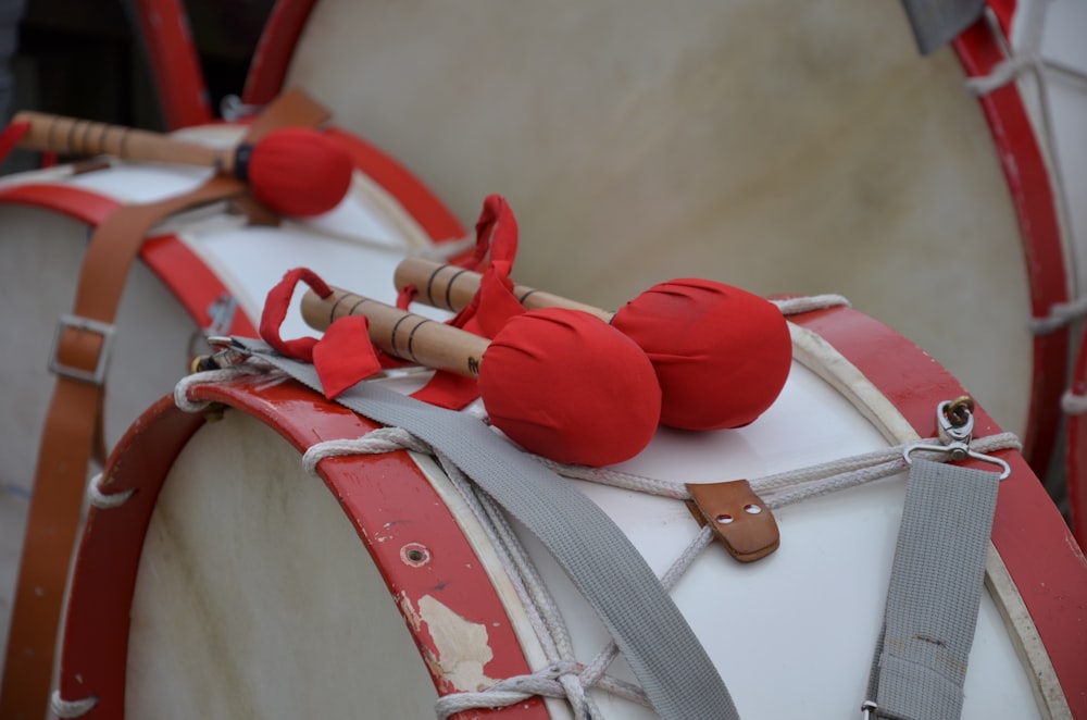 red and white drum sticks
