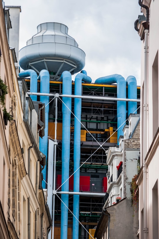 blue and brown concrete building during daytime in Centre Georges Pompidou France