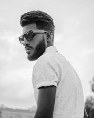 A professional portrait of Sabbir Alom Shuvo.