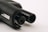 Close-up of the barrel and part of a firearm, focusing on the metal components and details. The surface texture and dark coloration dominate the image.