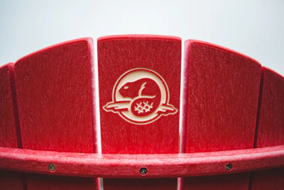 Close-up of a comfortable aluminum recliner chair with adjustable backrest and weather-resistant cushions.