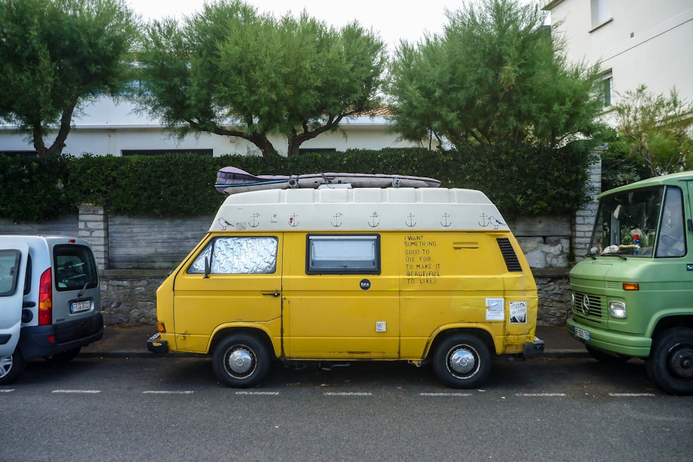 yellow van parked beside river during daytime