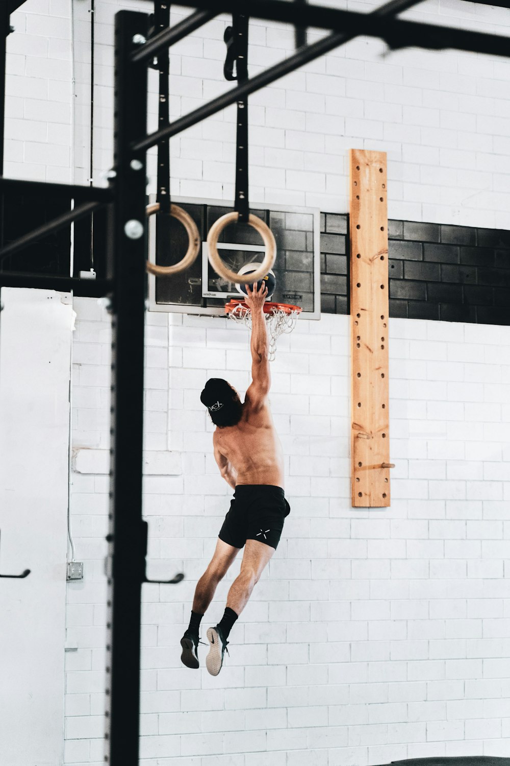 man in black shorts doing exercise