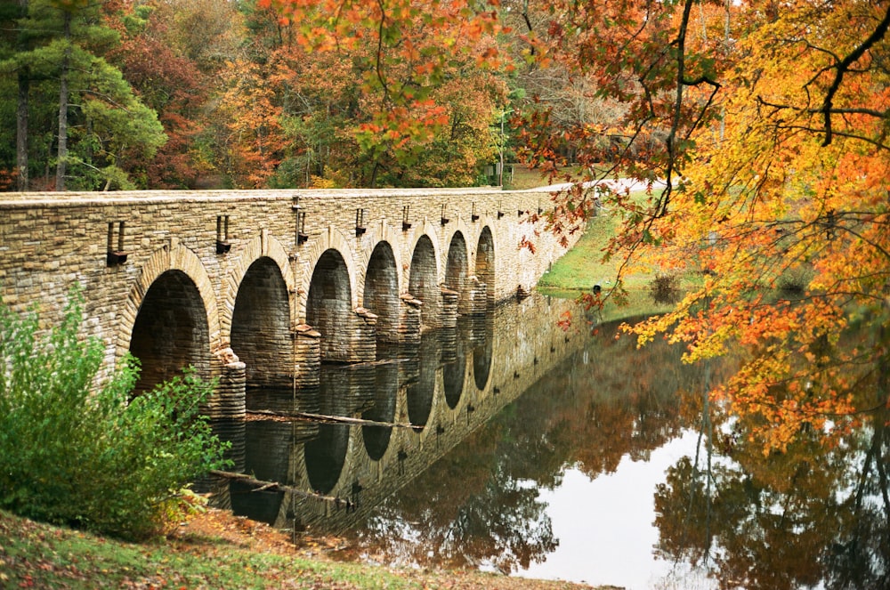 gray concrete bridge over river